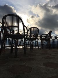 Chairs against sky
