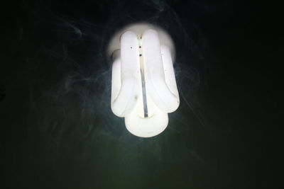 Close-up of illuminated light bulb