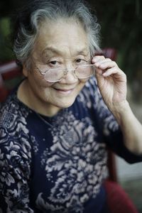 Close-up portrait of old woman