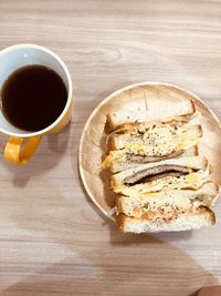 High angle view of coffee cup on table