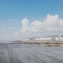 View of bridge in city against sky