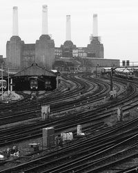 View of railroad tracks with buildings in background