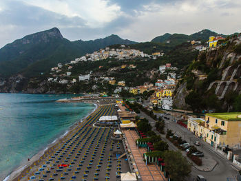 High angle view of swimming pool by sea against sky