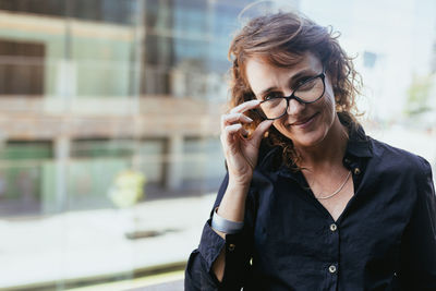 Young woman talking on mobile phone
