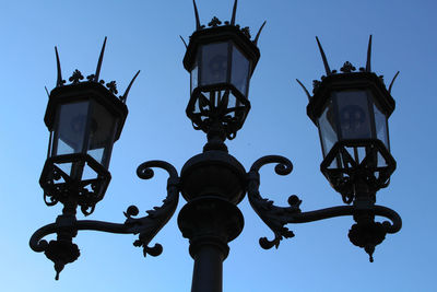 Low angle view of street light against clear sky