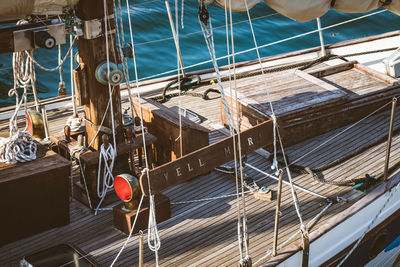 High angle view of sailboats moored at harbor