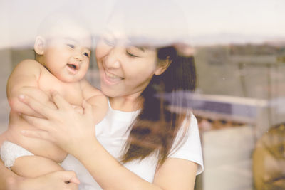 Close-up of mother and daughter