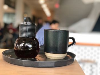 Close-up of coffee cup on table