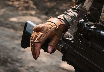 Close-up of man holding camera