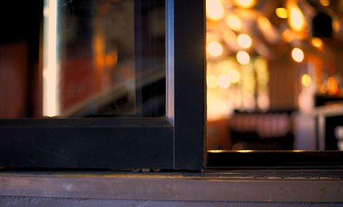 Close-up of train window at night