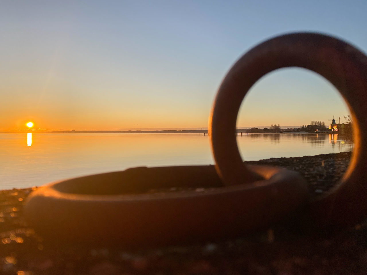 SCENIC VIEW OF LAKE DURING SUNSET