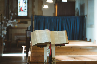 Open book on table at temple