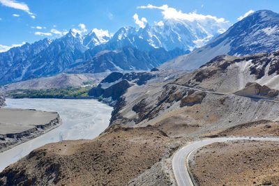 Scenic view of snowcapped mountains against sky