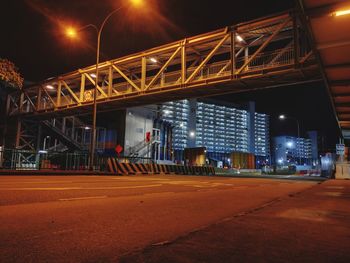 View of illuminated bridge at night