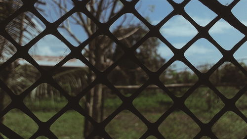 Full frame shot of fence against sky