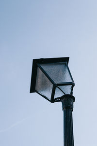 Low angle view of street light against clear sky