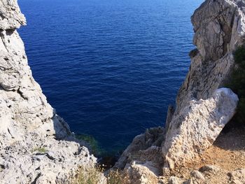 High angle view of rock formation at sea shore