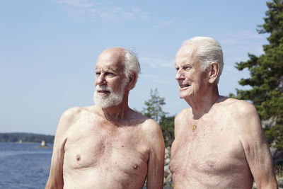 Senior men at water