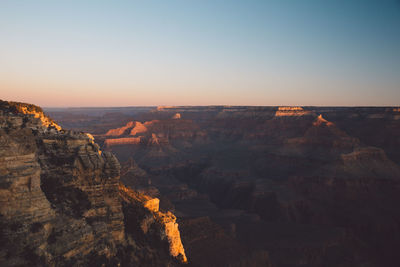 Grand canyon national park against clear sky during sunset