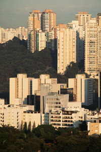 High angle view of buildings in city against sky