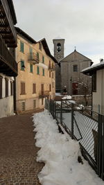 Buildings against sky during winter