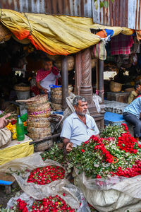 People at market stall