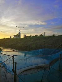 Scenic view of landscape against sky during sunset