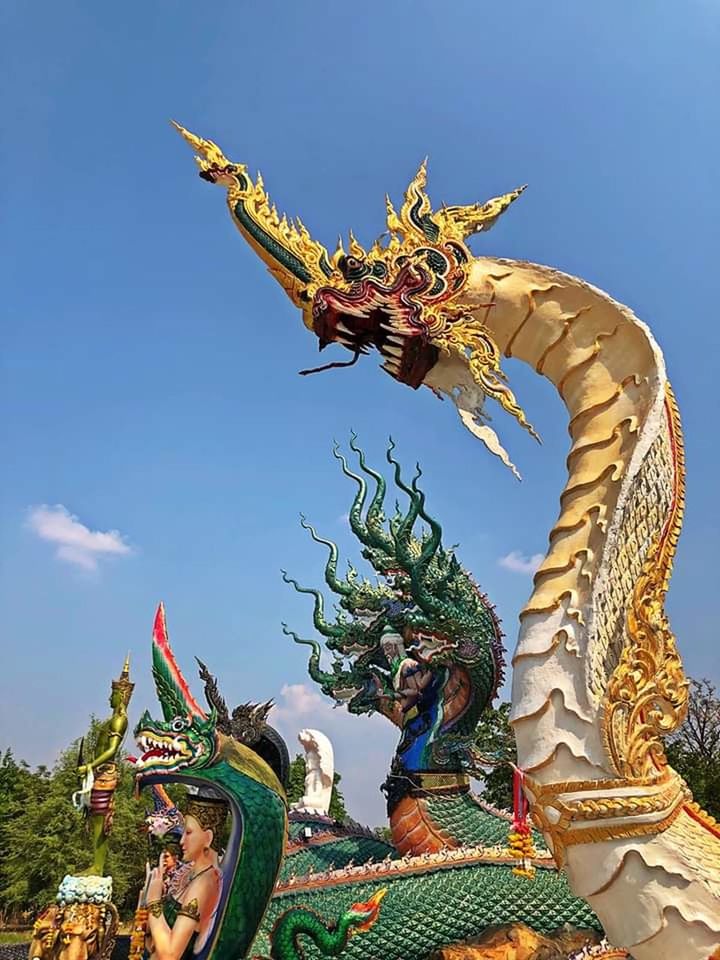 LOW ANGLE VIEW OF DRAGON STATUE AGAINST SKY