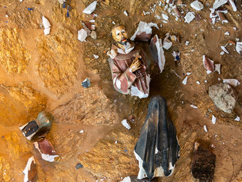 High angle view of people on rock