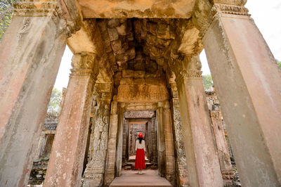 Woman visiting old temple