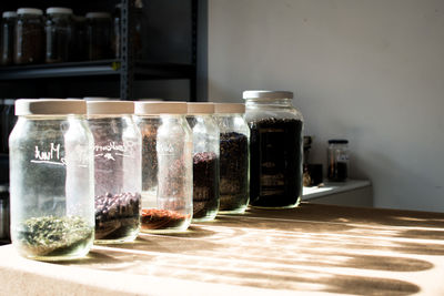 Close-up of glasses on table