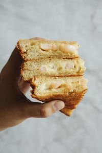 Close-up of hand holding ice cream