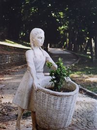 Statue of woman in spring