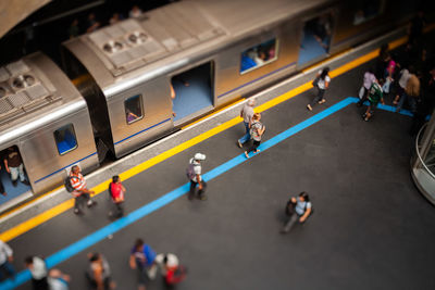 High angle view of people running on street