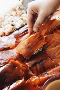 Close-up of person preparing food