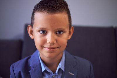 Close-up portrait of boy at home