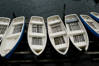 Boats moored at harbor