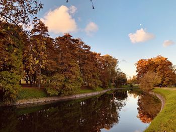 Scenic view of lake against sky during autumn