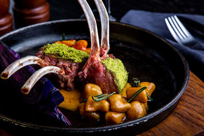 Close-up of meat in plate on table