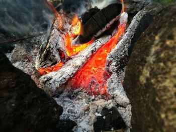 Close-up of bonfire on rock