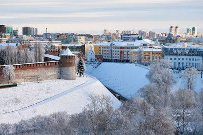 High angle view of buildings against sky during winter