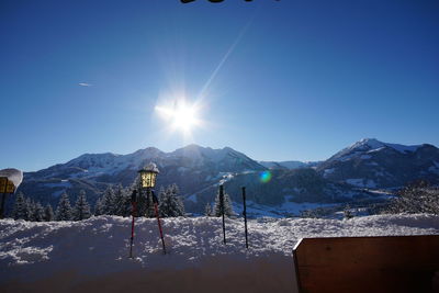 Scenic view of snowcapped mountains against clear sky