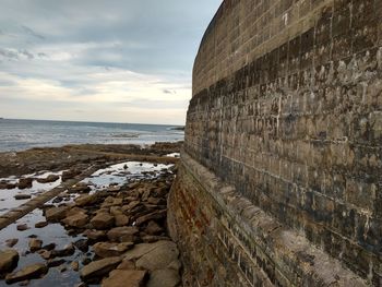 View of sea against cloudy sky