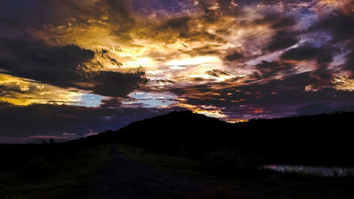 Scenic view of dramatic sky during sunset