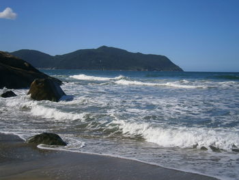 Scenic view of sea against clear sky