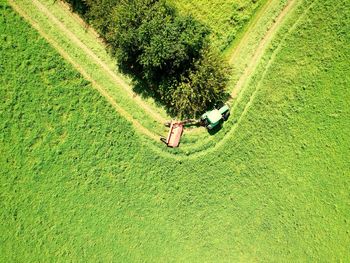 Aerial view of tractor over field at farm