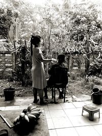 Rear view of couple standing outdoors