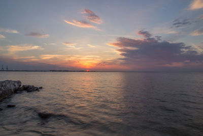 Scenic view of sea at sunset