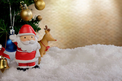 Close-up of stuffed toy on snow