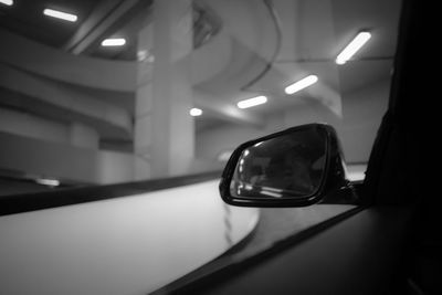 Reflection of illuminated lights on side-view mirror